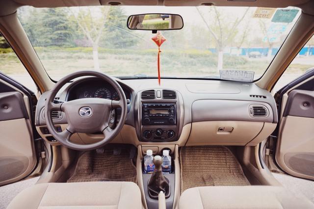 经济适用大玩具-海南马自达323-