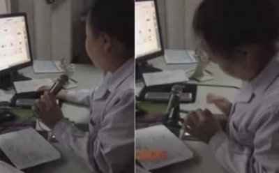 ​女医生边看病边“打麻将” 还将音效外放